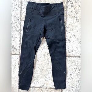 Lululemon 3/4 length leggings with diagonal mesh on back legs and front pockets